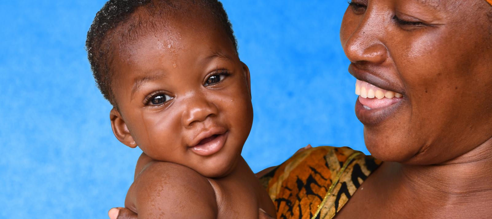 Madoue, a 36 years old mother is cuddling her 5 months old son Abdel