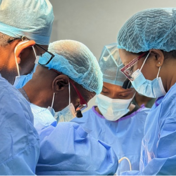 Dr. Rodney Taylor and colleagues perform a surgery in Guyana