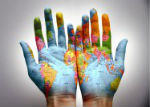 Hands with a map of the world projected on it
