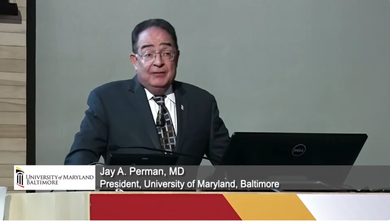 Screenshot of Dr. Perman giving a speech