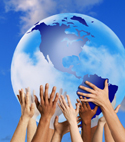 Hands holding up globe