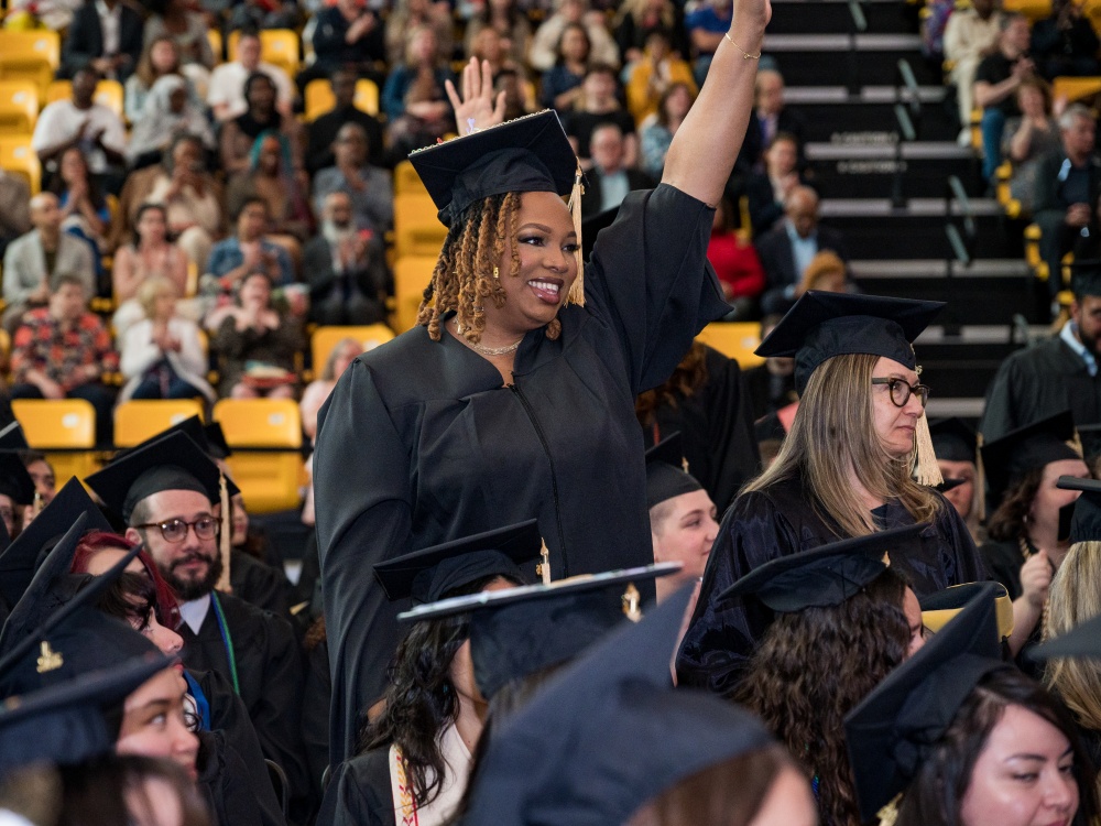 University of Maryland School of Social Work gradautes of the Class of 2026 celebrate at the conclusion of its convocation ceremony on May 15, 2026, at SECU Arena. Photo by Kellie Finch