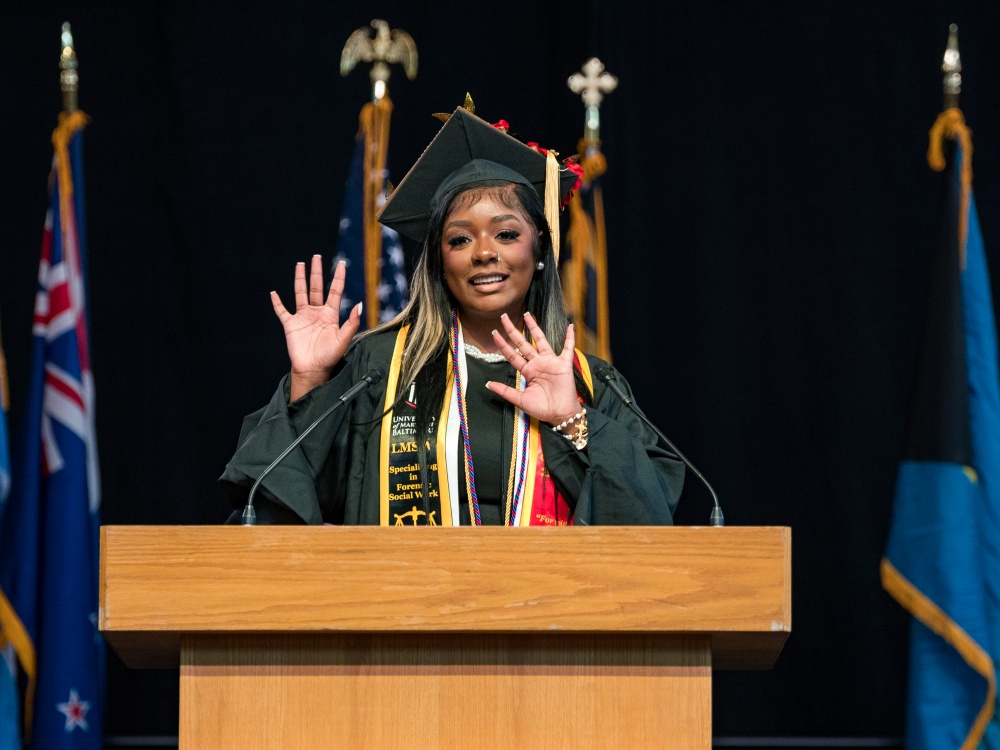UMSSW Convocation student speaker Denise Haney delivers remarks to the Class of 2026. Photo by Kellie Finch