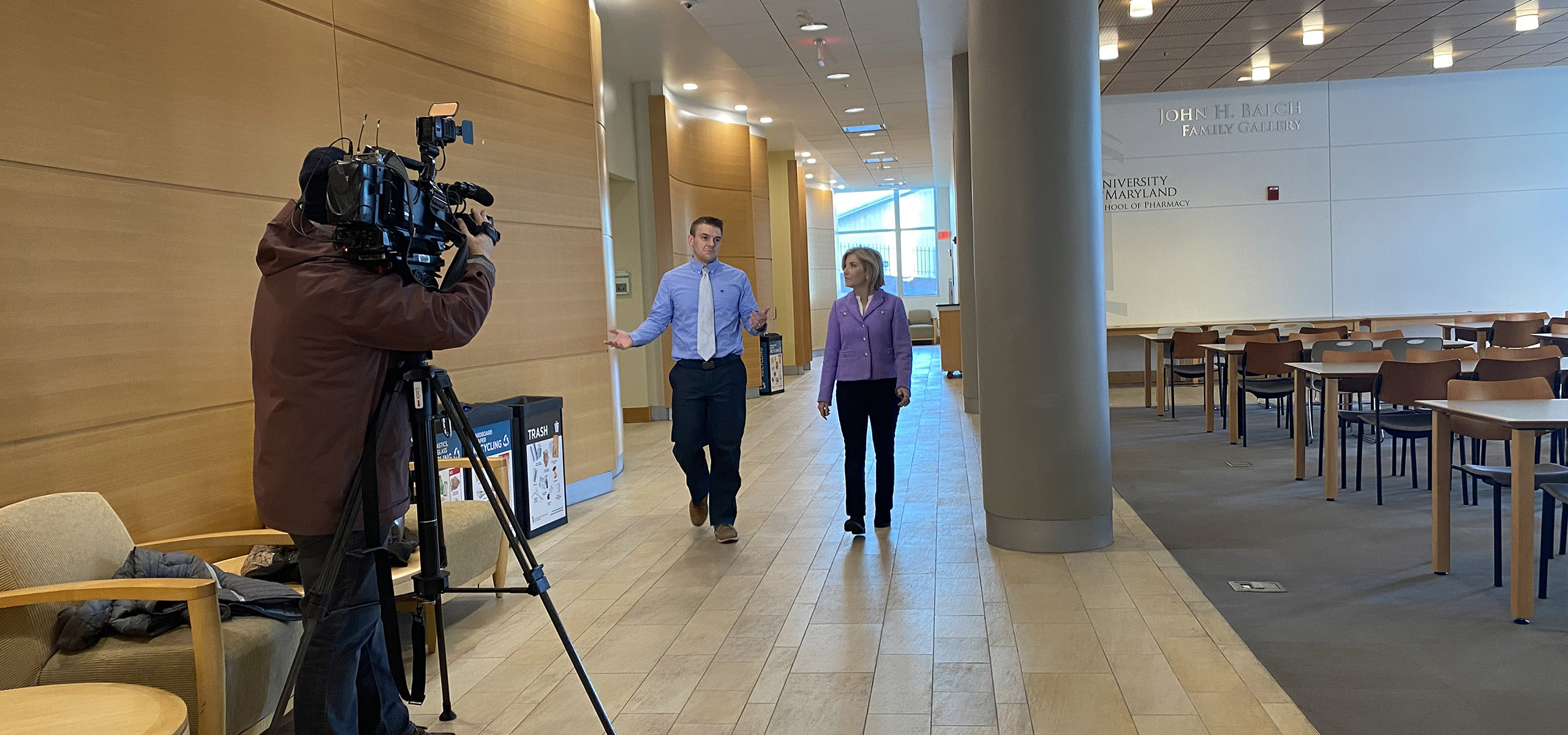 UMB Faculty Expert being interviewed on campus