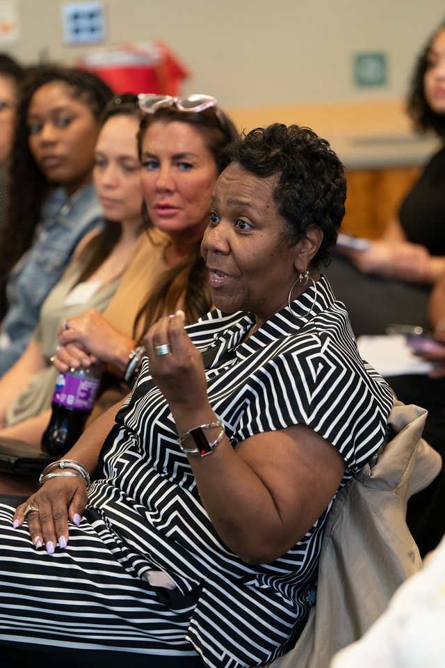 A participant at the 2025 Maryland Child Trafficking Conference asks a question during a breakout session.