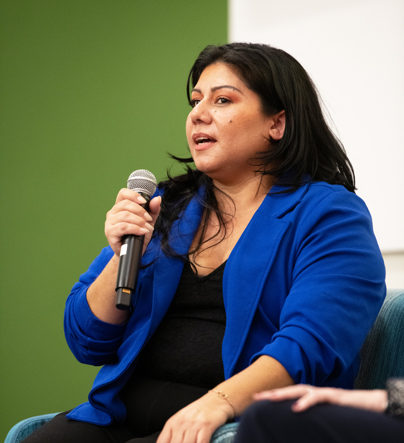 Olga, a survivor of human trafficking, tells her story in a forum
