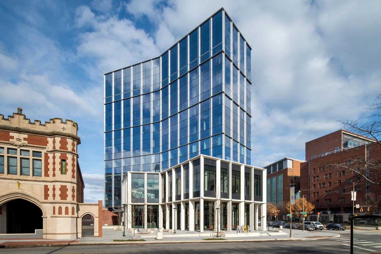 UM bioPark building on a blue sky day; building is mirrored and modern