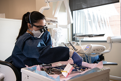 A student cleaning teeth