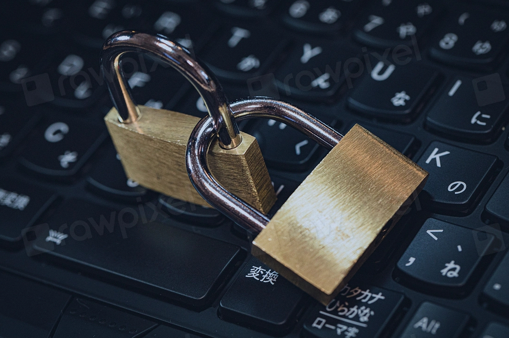 Image of interlocked padlocks over a keyboard.  CC0 1.0 Universal license